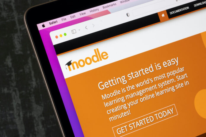 Los Angeles, CA, USA - May 13, 2022: Website homepage of Moodle, a free open source learning platform or course management system (CMS), is seen on a MacBook computer.